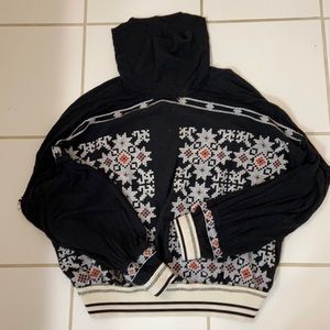 Free people size large embroidered pull over with banded waist and sleeves